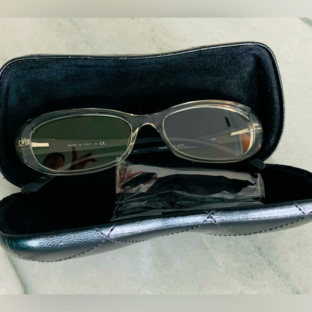 Chanel glasses (clear non-prescription lenses) never worn with Chanel case.